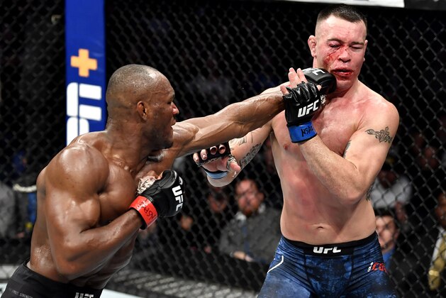 LAS VEGAS, NEVADA - DECEMBER 14:  in their UFC welterweight championship bout during the UFC 245 event at T-Mobile Arena on December 14, 2019 in Las Vegas, Nevada. (Photo by Jeff Bottari/Zuffa LLC via Getty Images)