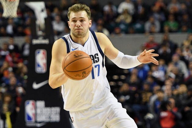 MEXICO CITY, MEXICO - DECEMBER 12: Luka Doncic #77 of the Dallas Mavericks handles the ball against the Detroit Pistons during the game as part of the NBA Mexico Games 2019 on December 12, 2019 at the Mexico City Arena in Mexico City, Mexico. NOTE TO USER: User expressly acknowledges and agrees that, by downloading and/or using this photograph, user is consenting to the terms and conditions of the Getty Images License Agreement.  Mandatory Copyright Notice: Copyright 2019 NBAE (Photo by Andrew D. Bernstein/NBAE via Getty Images)