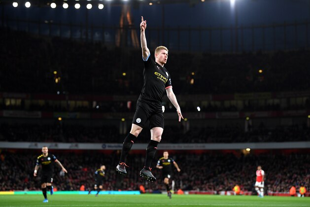 LONDON, ENGLAND - DECEMBER 15: Kevin De Bruyne of Manchester City celebrates after scoring his team's first goal during the Premier League match between Arsenal FC and Manchester City at Emirates Stadium on December 15, 2019 in London, United Kingdom. (Photo by Shaun Botterill/Getty Images)
