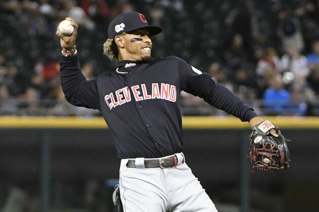 Cleveland Indians shortstop Francisco Lindor (12) takes infield practice during the first inning of a baseball game against the Chicago White Sox,Thursday, Sept. 26, 2019, in Chicago. (AP Photo/David Banks)