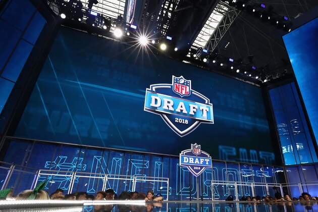 ARLINGTON, TX - APRIL 26:  The 2018 NFL Draft logo is seen on a video board during the first round of the 2018 NFL Draft at AT&T Stadium on April 26, 2018 in Arlington, Texas.  (Photo by Ronald Martinez/Getty Images)
