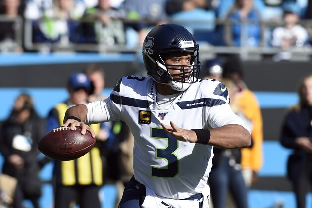 Seattle Seahawks quarterback Russell Wilson (3) passes during the first half of an NFL football game against the Carolina Panthers in Charlotte, N.C., Sunday, Dec. 15, 2019. (AP Photo/Mike McCarn)