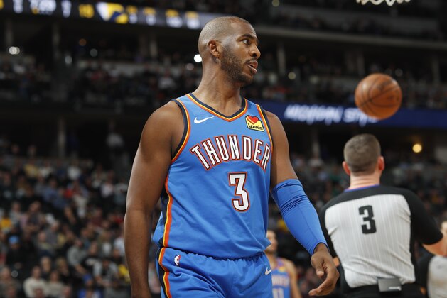 Oklahoma City Thunder guard Chris Paul looks to the bench after being fouled by the Denver Nuggets in the first half of an NBA basketball game Saturday, Dec. 14, 2019, in Denver. (AP Photo/David Zalubowski)