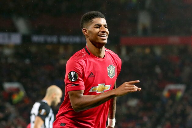 MANCHESTER, ENGLAND - NOVEMBER 07: Marcus Rashford of Manchester United celebrates after scoring his team's third goal  during the UEFA Europa League group L match between Manchester United and Partizan at Old Trafford on November 07, 2019 in Manchester, United Kingdom. (Photo by Alex Livesey/Getty Images)