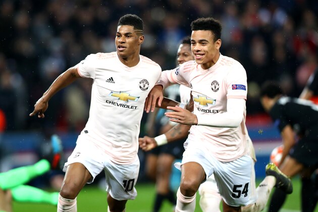 PARIS, FRANCE - MARCH 06: Marcus Rashford of Manchester United celebrates scoring his team's third goal with Mason Greenwood during the UEFA Champions League Round of 16 second leg match between Paris Saint Germain and Manchester United at Le Parc des Princes on March 6, 2019 in Paris, France. (Photo by Chloe Knott - Danehouse/Getty Images)
