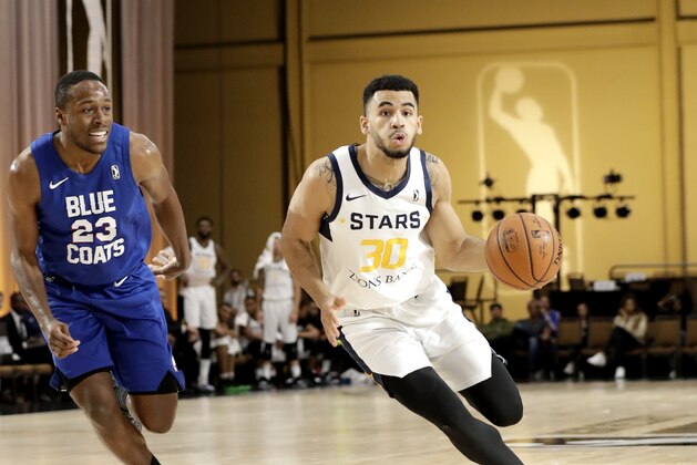 LAS VEGAS, NV - DECEMBER 22: Naz Mitrou-Long #30 of the Salt Lake City Stars handles the ball against the Delaware Blue Coasts during the NBA G League Winter Showcase at Mandalay Bay Events Center in Las Vegas, Nevada on December 22, 2018. NOTE TO USER: User expressly acknowledges and agrees that, by downloading and/or using this Photograph, user is consenting to the terms and conditions of the Getty Images License Agreement. Mandatory Copyright Notice: Copyright 2018 NBAE (Photo by Isaac Brekken/NBAE via Getty Images)