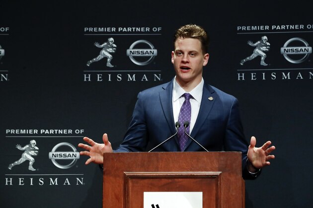 NCAA college football player, LSU quarterback Joe Burrow talks to the media during a news conference after winning the Heisman Trophy, Saturday, Dec. 14, 2019, in New York. (AP Photo/Jason Szenes)