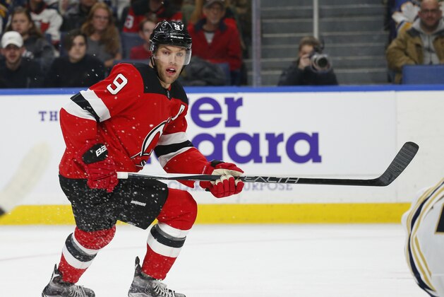 New Jersey Devils forward Taylor Hall (9) skates during the second period of an NHL hockey game against the Buffalo Sabres, Monday, Dec. 2, 2019, in Buffalo, N.Y. (AP Photo/Jeffrey T. Barnes)