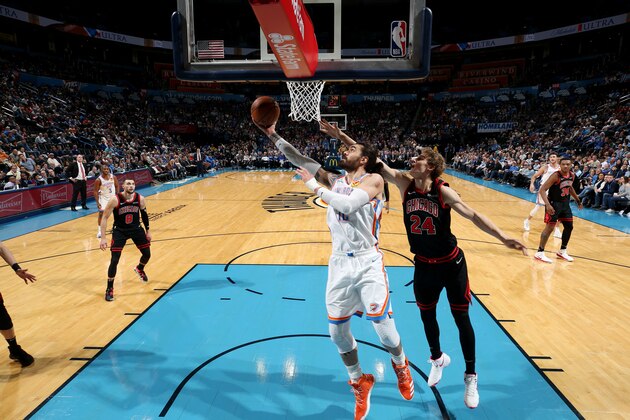 OKLAHOMA CITY, OK- DECEMBER 16: Steven Adams #12 of the Oklahoma City Thunder drives to the basket during a game against the Chicago Bulls on December 16, 2019 at Chesapeake Energy Arena in Oklahoma City, Oklahoma. NOTE TO USER: User expressly acknowledges and agrees that, by downloading and or using this photograph, User is consenting to the terms and conditions of the Getty Images License Agreement. Mandatory Copyright Notice: Copyright 2019 NBAE (Photo by Zach Beeker/NBAE via Getty Images)