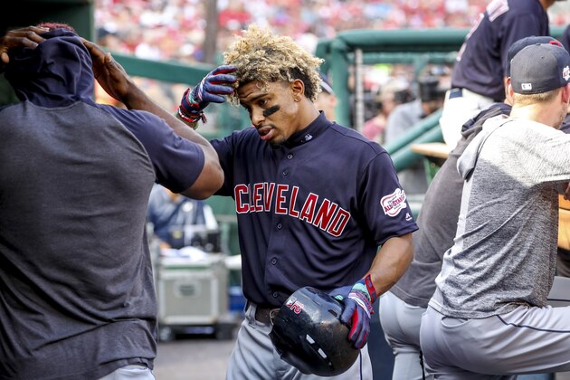 Cleveland Indians' Francisco Lindor returns to the dugout after scoring on a solo home run during the third inning of a baseball game against the Washington Nationals at Nationals Park, Sunday, Sept. 29, 2019, in Washington. (AP Photo/Andrew Harnik)
