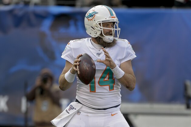 Miami Dolphins quarterback Ryan Fitzpatrick (14) steps back to pass against the New York Giants during the second quarter of an NFL football game, Sunday, Dec. 15, 2019, in East Rutherford, N.J. (AP Photo/Seth Wenig)