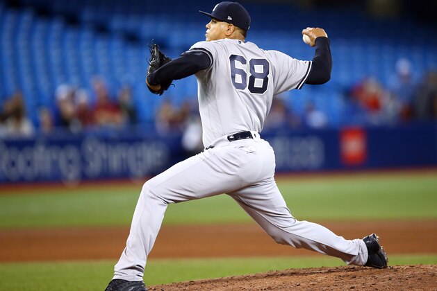 TORONTO, ON - SEPTEMBER 15:  Dellin Betances #68 of the New York Yankees delivers a pitch in the fourth inning during a MLB game against the Toronto Blue Jays at Rogers Centre on September 15, 2019 in Toronto, Canada.  (Photo by Vaughn Ridley/Getty Images)