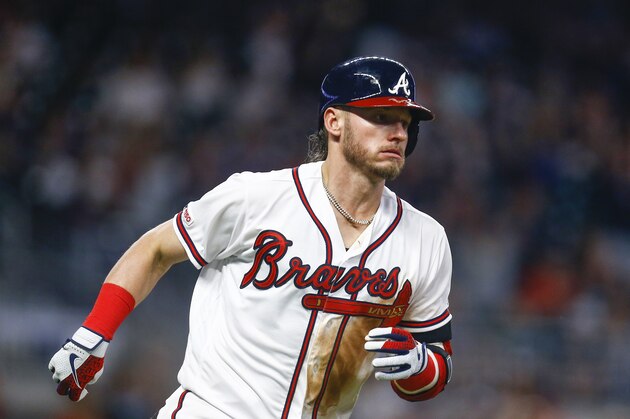 Atlanta Braves third baseman Josh Donaldson (20) runs the bases after hitting a homer during the eighth inning of a baseball game against the Chicago White Sox, Saturday, Aug. 31, 2019, in Atlanta, Ala. (AP Photo/Butch Dill)