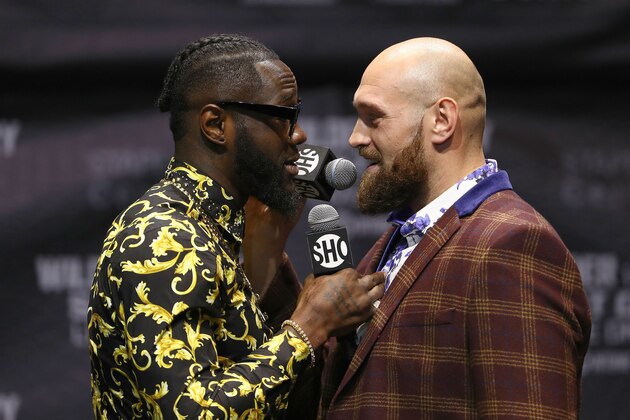 LOS ANGELES, CA - OCTOBER 03:  Professional boxers Deontay Wilder (L) and Tyson Fury speak face-to-face onstage during a press conference to promote their upcoming December 1, 2018 fight in Los Angeles at The Novo by Microsoft on October 3, 2018 in Los Angeles, California.  (Photo by Victor Decolongon/Getty Images)