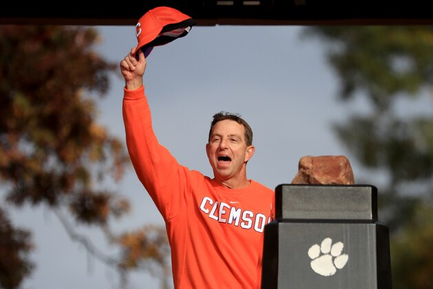 CLEMSON, SOUTH CAROLINA - NOVEMBER 16: Head coach Dabo Swinney of the Clemson Tigers stands in front of Howard's Rock before their game against the Wake Forest Demon Deacons at Memorial Stadium on November 16, 2019 in Clemson, South Carolina. (Photo by Streeter Lecka/Getty Images)