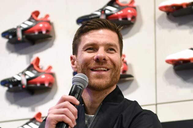 Spanish former footballer Xabier Alonso speaks during a talk session produced by Adidas Japan in Tokyo on January 30, 2018. 
Alonso is supervising the team