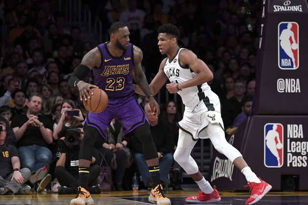 LOS ANGELES, CALIFORNIA - MARCH 01: LeBron James #23 of the Los Angeles Lakers is guraded by Giannis Antetokounmpo #34 of the Milwaukee Bucks during the game at Staples Center on March 01, 2019 in Los Angeles, California. NOTE TO USER: User expressly acknowledges and agrees that, by downloading and or using this photograph, User is consenting to the terms and conditions of the Getty Images License Agreement.  (Photo by Kevork Djansezian/Getty Images)