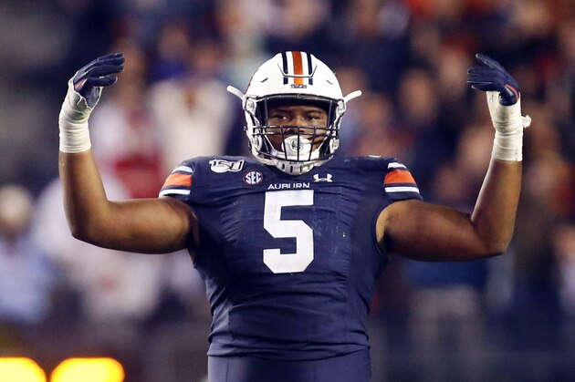 Auburn defensive tackle Derrick Brown (5) reacts after a stop against Georgia during the second half of an NCAA college football game, Saturday, Nov. 16, 2019, in Auburn, Ala. (AP Photo/Butch Dill)