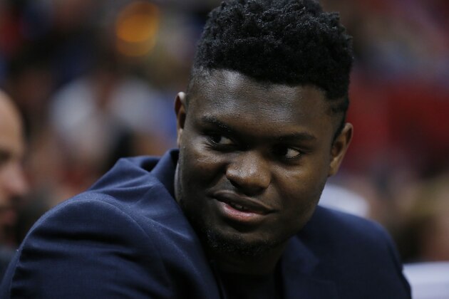 MIAMI, FLORIDA - NOVEMBER 16: Zion Williamson #1 of the New Orleans Pelicans looks on from the bench against the Miami Heat during the first half at American Airlines Arena on November 16, 2019 in Miami, Florida. NOTE TO USER: User expressly acknowledges and agrees that, by downloading and/or using this photograph, user is consenting to the terms and conditions of the Getty Images License Agreement. (Photo by Michael Reaves/Getty Images)