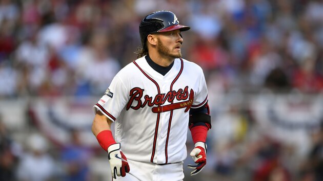 Atlanta Braves' Josh Donaldson hits a home run during the fourth inning of Game 5 of their National League Division Series baseball game against the St. Louis Cardinals, Wednesday, Oct. 9, 2019, in Atlanta. (AP Photo/John Amis)