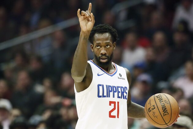 LOS ANGELES, CA - DECEMBER 17: Patrick Beverley #21 of the LA Clippers handles the ball against the Phoenix Suns on December 17, 2019 at STAPLES Center in Los Angeles, California. NOTE TO USER: User expressly acknowledges and agrees that, by downloading and/or using this Photograph, user is consenting to the terms and conditions of the Getty Images License Agreement. Mandatory Copyright Notice: Copyright 2019 NBAE (Photo by Chris Elise/NBAE via Getty Images)