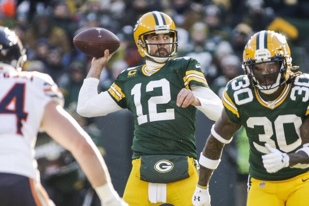 Green Bay Packers' Aaron Rodgers throws during the first half of an NFL football game against the Chicago Bears Sunday, Dec. 15, 2019, in Green Bay, Wis. (AP Photo/Mike Roemer)