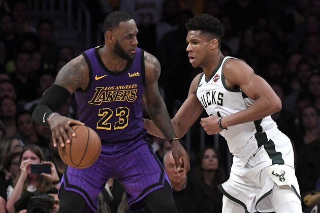 LOS ANGELES, CALIFORNIA - MARCH 01: LeBron James #23 of the Los Angeles Lakers is guraded by Giannis Antetokounmpo #34 of the Milwaukee Bucks during the game at Staples Center on March 01, 2019 in Los Angeles, California. NOTE TO USER: User expressly acknowledges and agrees that, by downloading and or using this photograph, User is consenting to the terms and conditions of the Getty Images License Agreement.  (Photo by Kevork Djansezian/Getty Images)