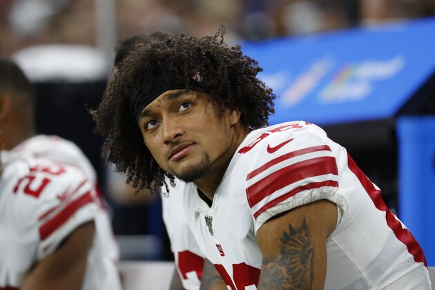 New York Giants tight end Evan Engram watches against the Detroit Lions during an NFL football game in Detroit, Sunday, Oct. 27, 2019. (AP Photo/Paul Sancya)