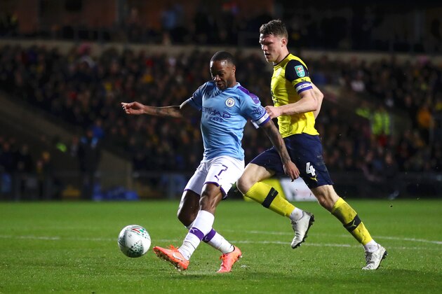 OXFORD, ENGLAND - DECEMBER 18: Raheem Sterling of Manchester City shoots during the Carabao Cup Quarter Final match between Oxford United and Manchester City at Kassam Stadium on December 18, 2019 in Oxford, England. (Photo by Julian Finney/Getty Images)