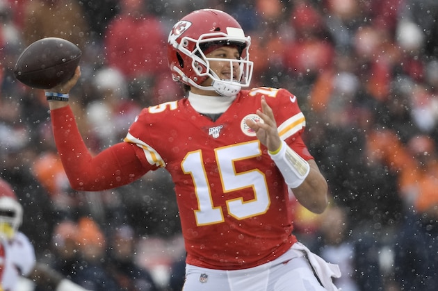 Kansas City Chiefs quarterback Patrick Mahomes (15) throws against the Denver Broncos during the first half of an NFL football game in Kansas City, Mo., Sunday, Dec. 15, 2019. (AP Photo/Reed Hoffmann)