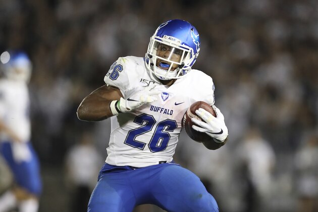 Buffalo running back Jaret Patterson (26) runs with the ball during an NCAA college football game against Penn State, Saturday, Sept. 7, 2019, in University Park, Pa. Penn State won 45-13. (AP Photo/Steve Luciano)