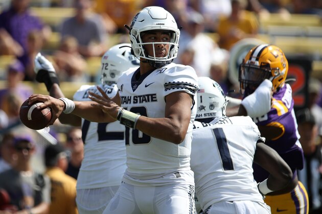 BATON ROUGE, LOUISIANA - OCTOBER 05: Quarterback Jordan Love #10 of the Utah State Aggies looks to throw a pass against the LSU Tigers at Tiger Stadium on October 05, 2019 in Baton Rouge, Louisiana. (Photo by Chris Graythen/Getty Images)