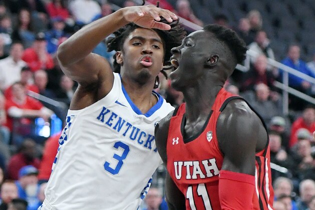 LAS VEGAS, NEVADA - DECEMBER 18:  Both Gach #11 of the Utah Utes drives against Tyrese Maxey #3 of the Kentucky Wildcats during the annual Neon Hoops Showcase benefiting Coaches vs. Cancer at T-Mobile Arena on December 18, 2019 in Las Vegas, Nevada.  (Photo by Ethan Miller/Getty Images)