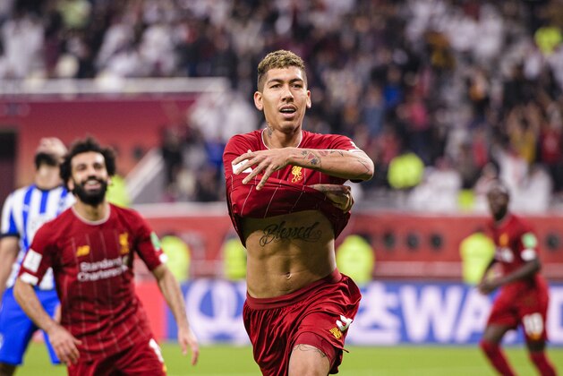 DOHA, QATAR - DECEMBER 18: Roberto Firmino of Liverpool celebrates after scoring the second goal of his team during FIFA Club World Cup Semi-Final match between Monterrey and Liverpool FC at Education City Stadium on December 18, 2019 in Doha, Qatar. (Photo by Marcio Machado/Eurasia Sport Images/Getty Images)