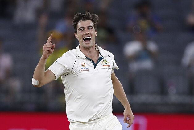 PERTH, AUSTRALIA - DECEMBER 15: Pat Cummins of Australia celebrates after taking the wicket of Mitchell Santner of New Zealand during day four of the First Test match in the series between Australia and New Zealand at Optus Stadium on December 15, 2019 in Perth, Australia. (Photo by Ryan Pierse/Getty Images)