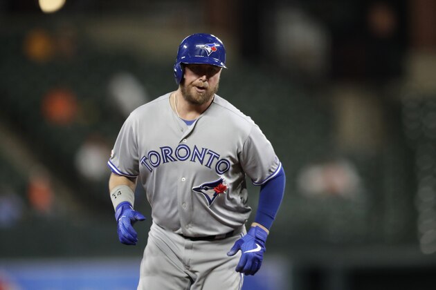 Toronto Blue Jays' Justin Smoak runs the bases after hitting a solo home run off Baltimore Orioles relief pitcher Mychal Givens during the ninth inning of a baseball game, Tuesday, Sept. 17, 2019, in Baltimore. The Blue Jays won 8-5. (AP Photo/Julio Cortez)
