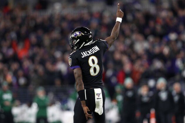 BALTIMORE, MARYLAND - DECEMBER 12: Quarterback Lamar Jackson #8 of the Baltimore Ravens celebrates after a touchdown in the first quarter of the game against the New York Jets at M&T Bank Stadium on December 12, 2019 in Baltimore, Maryland. (Photo by Patrick Smith/Getty Images)