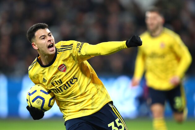 LONDON, ENGLAND - DECEMBER 09: Gabriel Martinelli of Arsenal celebrates after scoring his sides first goal  during the Premier League match between West Ham United and Arsenal FC at London Stadium on December 09, 2019 in London, United Kingdom. (Photo by Julian Finney/Getty Images)