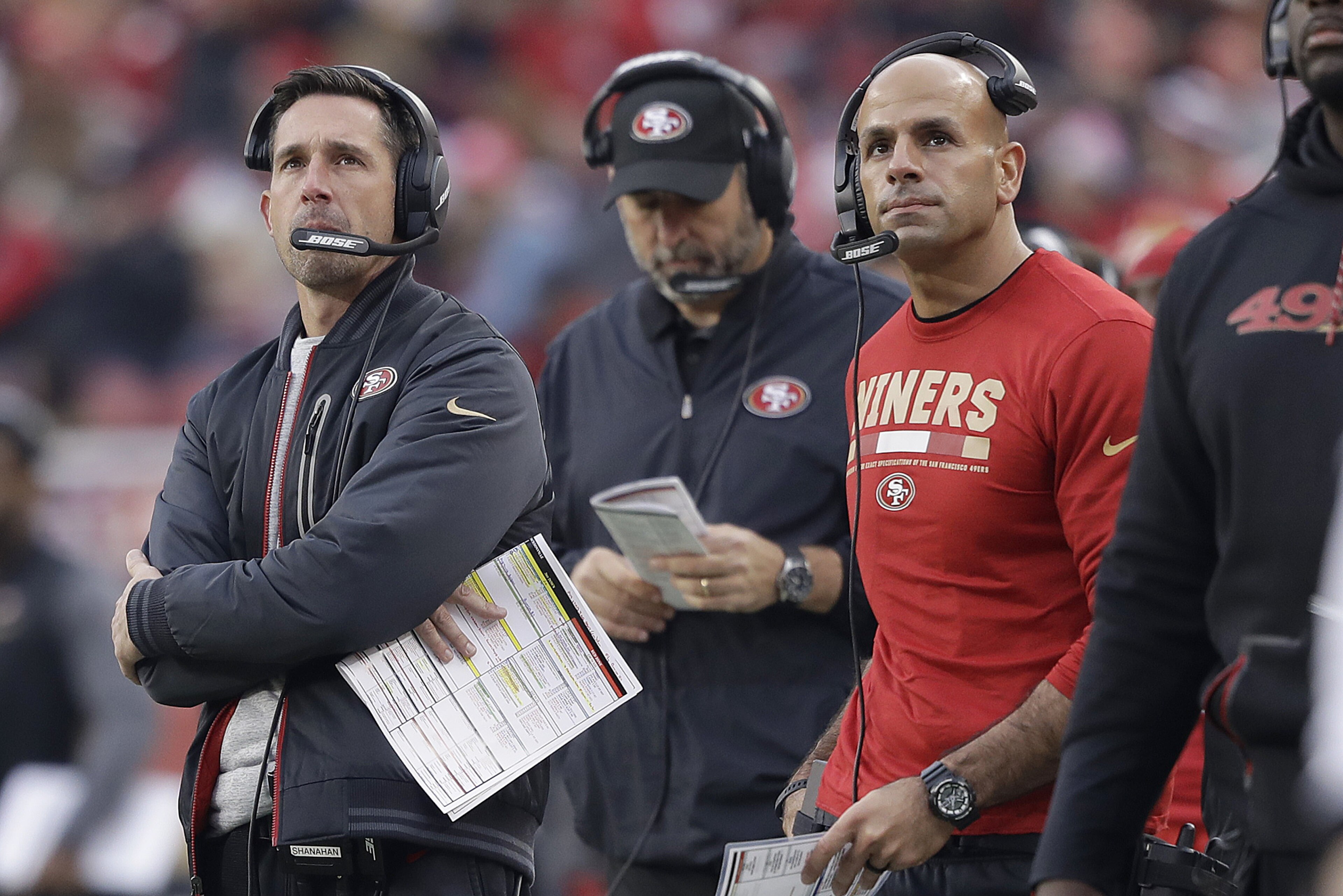 San Francisco 49ers head coach Kyle Shanahan, left, and defensive coordinator Robert Saleh watch during the second half of an NFL football game against the Jacksonville Jaguars in Santa Clara, Calif., Sunday, Dec. 24, 2017. (AP Photo/Marcio Jose Sanchez) San Francisco 49ers head coach Kyle Shanahan, left, and defensive coordinator Robert Saleh watch during the second half of an NFL football game against the Jacksonville Jaguars in Santa Clara, Calif., Sunday, Dec. 24, 2017. (AP Photo/Marcio Jose Sanchez)
