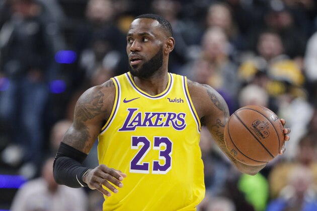 Los Angeles Lakers forward LeBron James (23) plays against the Indiana Pacers during the first half of an NBA basketball game in Indianapolis, Tuesday, Dec. 17, 2019. (AP Photo/Michael Conroy)