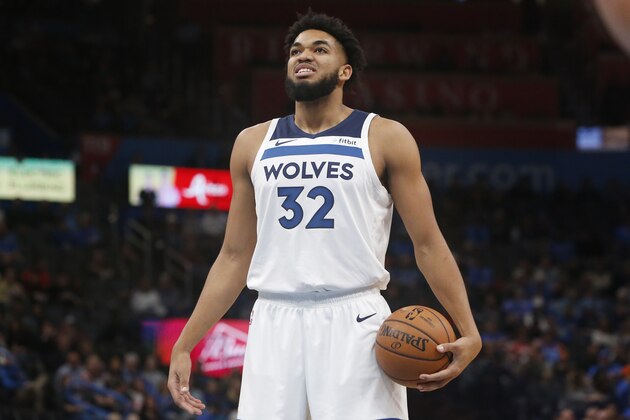 Minnesota Timberwolves center Karl-Anthony Towns (32) during an NBA basketball game against the Oklahoma City Thunder Friday, Dec. 6, 2019, in Oklahoma City. (AP Photo/Sue Ogrocki)