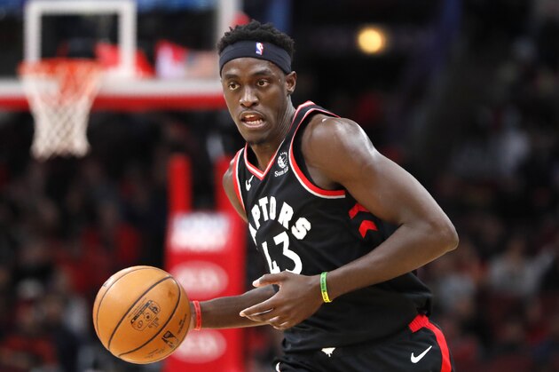 Toronto Raptors' Pascal Siakam advances the ball during the first half of an NBA basketball game against the Chicago Bulls Monday, Dec. 9, 2019, in Chicago. (AP Photo/Charles Rex Arbogast)