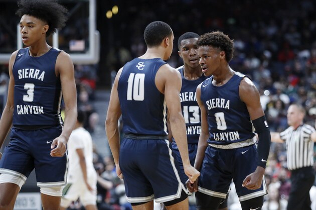 COLUMBUS, OH - DECEMBER 14: LeBron 'Bronny' James Jr. #0 of Sierra Canyon High School celebrates with teammates during the Ohio Scholastic Play-By-Play Classic against St. Vincent-St. Mary High School at Nationwide Arena on December 14, 2019 in Columbus, Ohio. (Photo by Joe Robbins/Getty Images)