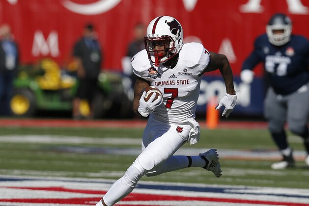 Arkansas State wide receiver Omar Bayless (7) in the first half during an NCAA college football bowl game against Nevada, Saturday, Dec. 29, 2018, in Tucson, AZ. (AP Photo/Rick Scuteri)