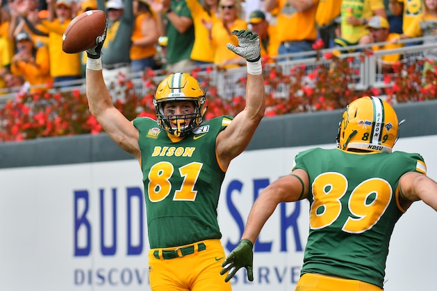 MINNEAPOLIS, MINNESOTA - AUGUST 31:  Tight end Josh Babicz #81  celebrates with wide receiver Cole Jacob #89 of the North Dakota State Bison after scoring a touchdown against the Butler Bulldogs during their game at Target Field on August 31, 2019 in Minneapolis, Minnesota.  (Photo by Sam Wasson/Getty Images)