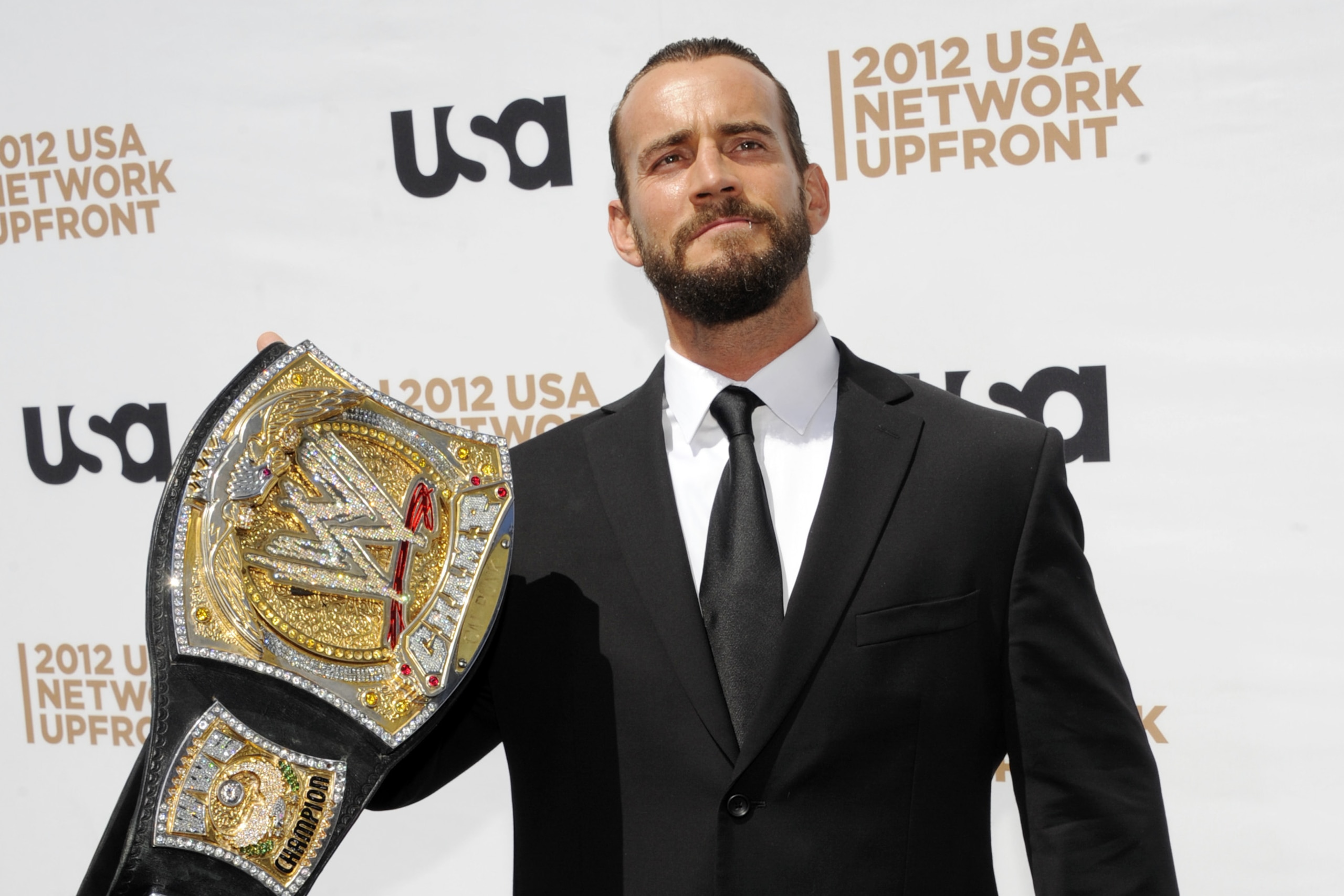 WWE wrestler CM Punk attends the USA network upfront presentation at Alice Tully Hall, Thursday, May 17, 2012 in New York. (AP Photo/Evan Agostini)