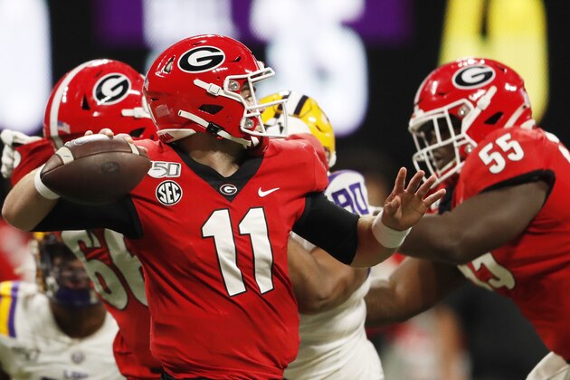 Georgia quarterback Jake Fromm (11) works in the pocket against LSU during the first half of the Southeastern Conference championship NCAA college football game, Saturday, Dec. 7, 2019, in Atlanta. (AP Photo/John Bazemore)