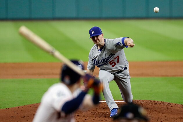 HOUSTON, TX - OCTOBER 28:  Alex Wood #57 of the Los Angeles Dodgers throws a pitch during the first inning against the Houston Astros in game four of the 2017 World Series at Minute Maid Park on October 28, 2017 in Houston, Texas.  (Photo by Pool/Getty Images)