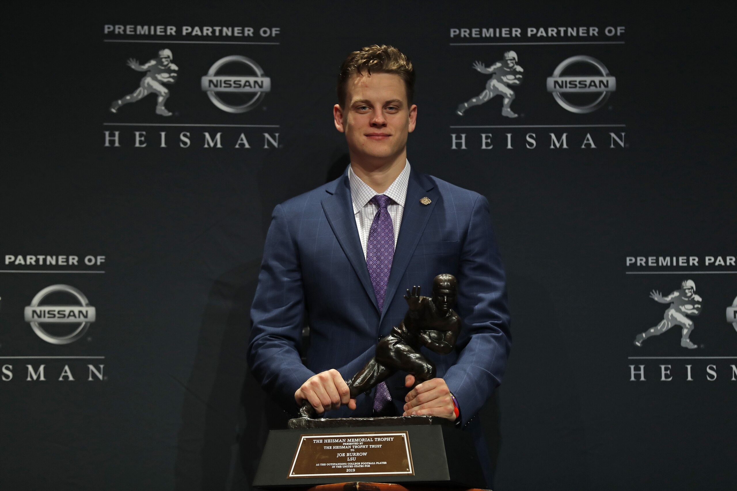 NEW YORK, NY - DECEMBER 14: Quarterback Joe Burrow of the LSU Tigers winner of the 85th annual Heisman Memorial Trophy poses for photos on December 14, 2019 at the Marriott Marquis in New York City. (Photo by Adam Hunger/Getty Images)