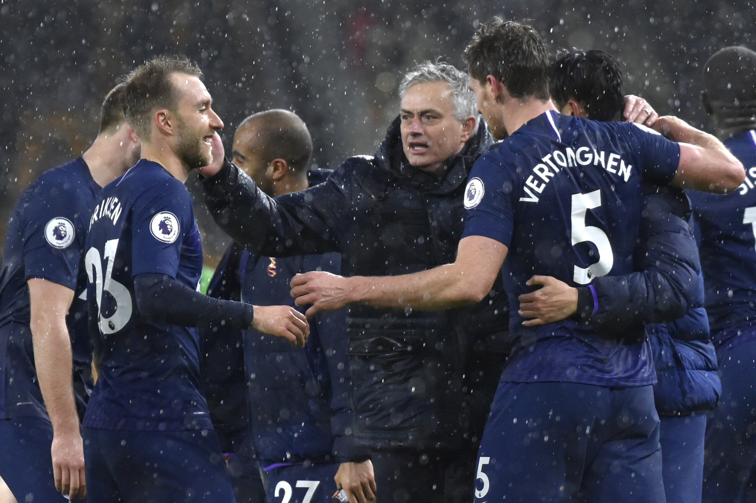 Tottenham's manager Jose Mourinho, centre, celebrates with his players at the end of the the English Premier League soccer match between Wolverhampton Wanderers and Tottenham Hotspur at the Molineux Stadium in Wolverhampton, England, Sunday, Dec. 15, 2019. (AP Photo/Rui Vieira)